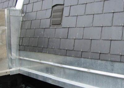 zinc flashing on a slate mansard roof